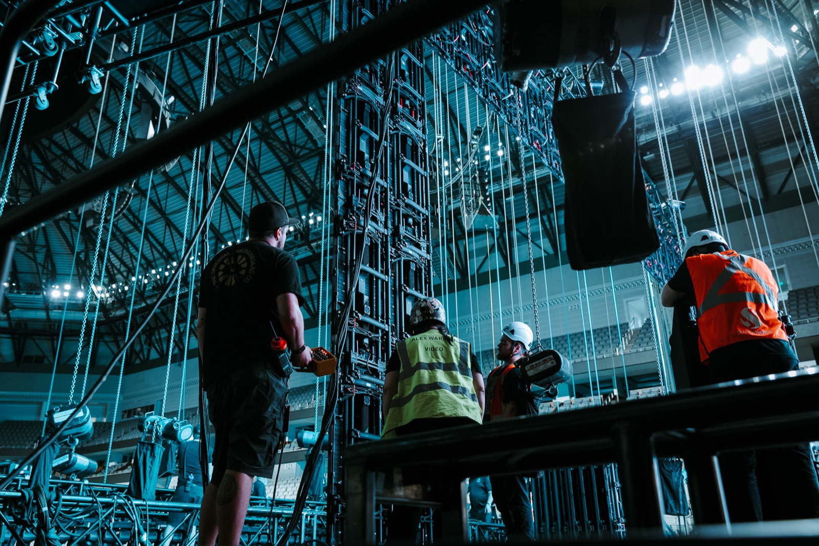 Crew looking up at the video wall during alignment