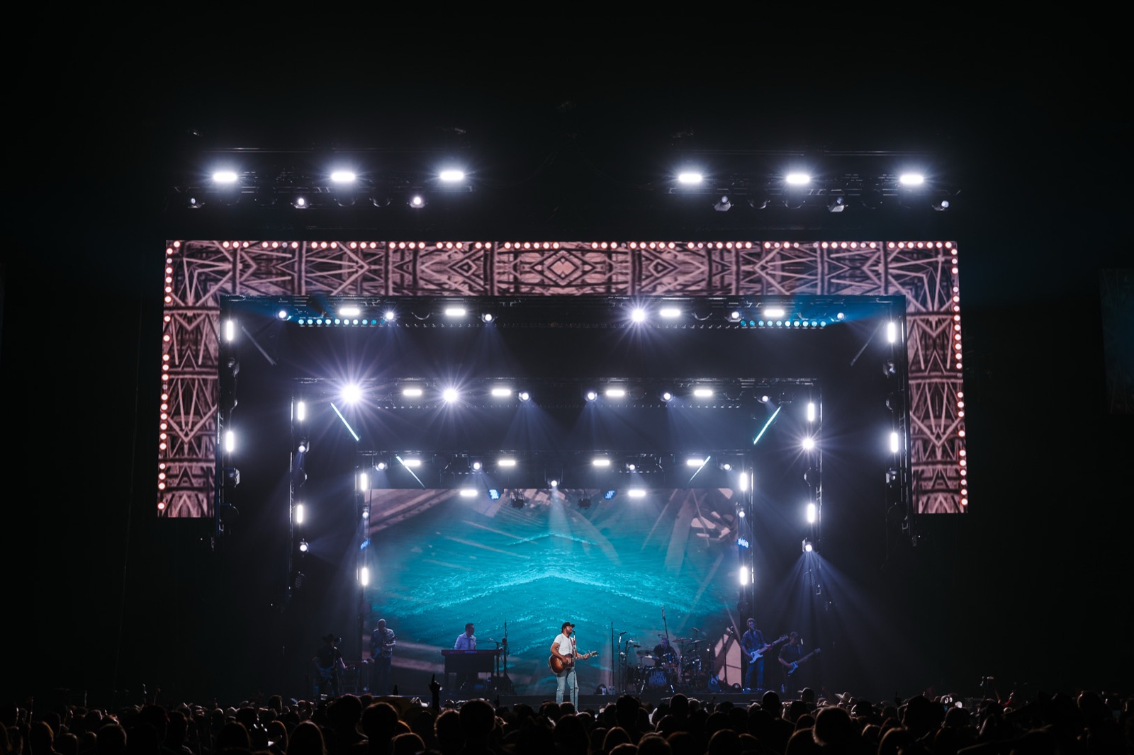 Wide view of the lit arena stage